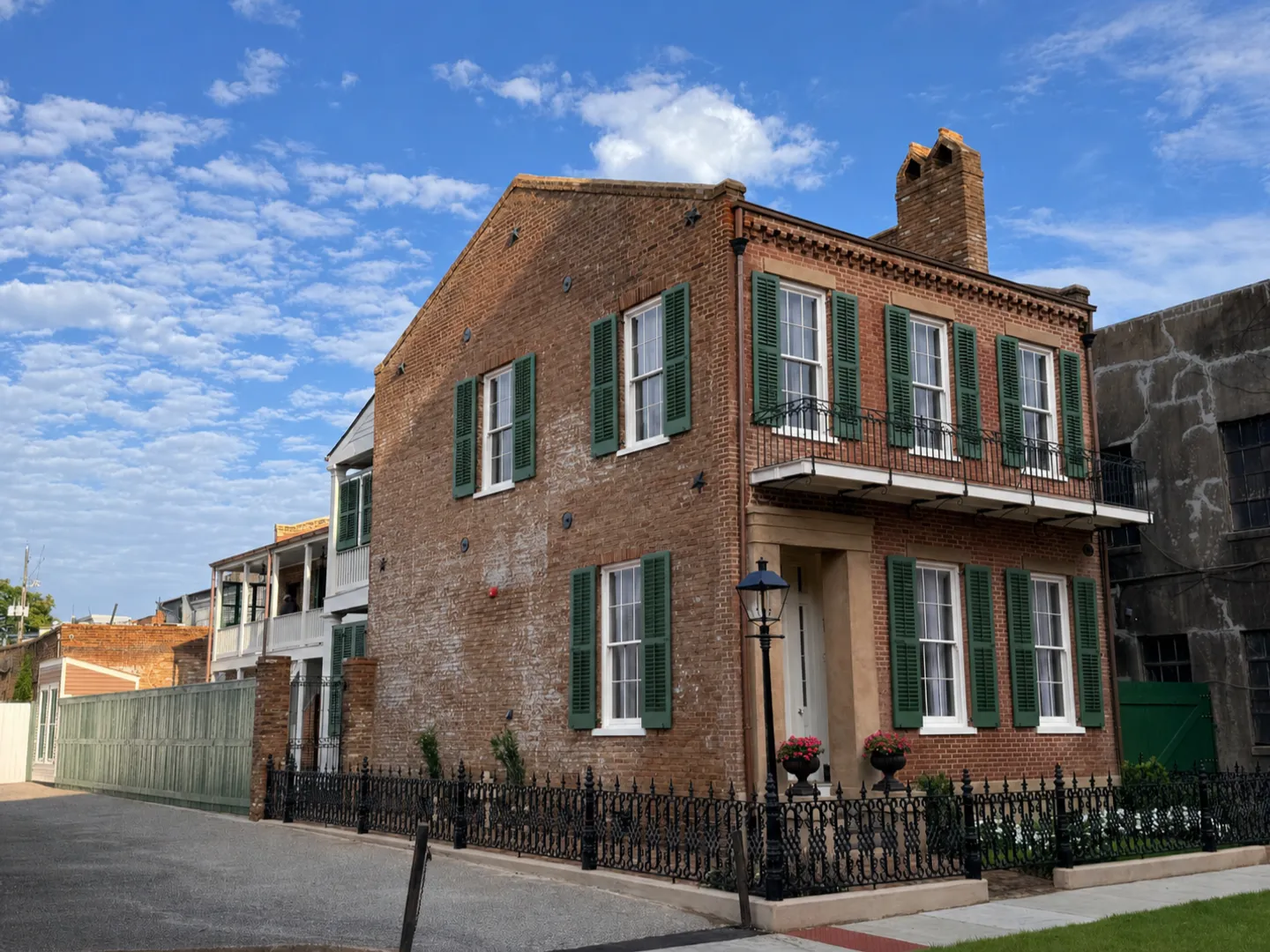 The restored brick exterior of the Chighizola House in downtown Mobile